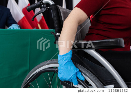 Wheelchair disabled and barriers posed for the disabled during the presidential election and daily functioning. 116861382