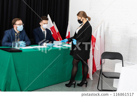 A young girl entitled to vote in the election of the President of Poland is waiting for the relevant documents to be issued. A young girl entitled to vote in the election of the President of Poland is waiting for the relevant documents to be issued. 116861517