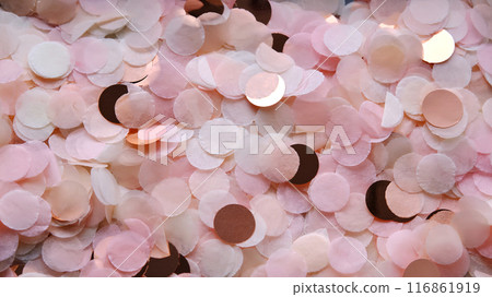 Festive background of soft pink confetti. Festive background of soft pink confetti. 116861919
