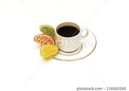 A cup of coffee and marmalade on a saucer on a white background A cup of coffee and marmalade on a saucer on a white background 116862088