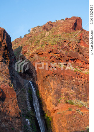 Rock and a waterfall, Madeira, Portugal 116862425