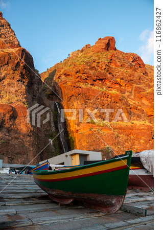 Boat and a mountain with waterfall, Madeira, Portugal 116862427