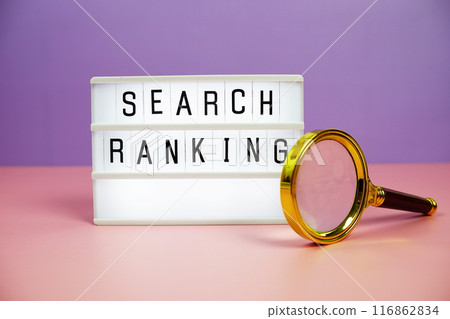 Search Ranking letterboard text on LED Lightbox and magnifying glass on pink and purple background Search Ranking letterboard text on LED Lightbox and magnifying glass on pink and purple background 116862834