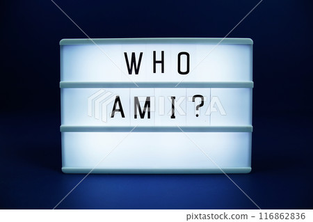 Who am I letterboard text on LED Lightbox on blue background 116862836
