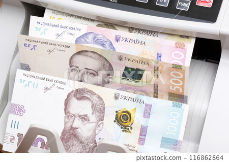 Ukrainian hryvnia in the counting machine Ukrainian hryvnia in the counting machine 116862864