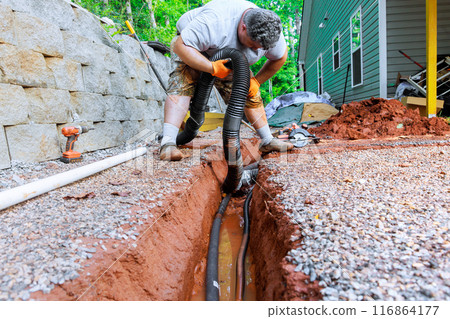 Laying assembling is drainage pipes for outflow of rainwater stormwater in trench underground 116864177