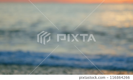 Setting Sun On Sea. Colorful Orange Sunlight Reflect On Sea Landscape With Summer Travel Concept. Blur. Setting Sun On Sea. Colorful Orange Sunlight Reflect On Sea Landscape With Summer Travel Concept. Blur. 116864266