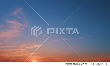 Beautiful colorful colored clouds in the summer sky. Multicolored bright sky at sunset. Beautiful colorful colored clouds in the summer sky. Multicolored bright sky at sunset. 116864591