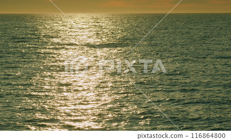 Wavy Water Surface Background With Ripples And Glares. Golden Glittering Sea Surface. Real time. Wavy Water Surface Background With Ripples And Glares. Golden Glittering Sea Surface. Real time. 116864800