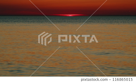 Setting Sun On Sea. Colorful Orange Sunlight Reflect On Sea Landscape With Summer Travel Concept. Slow motion. 116865015