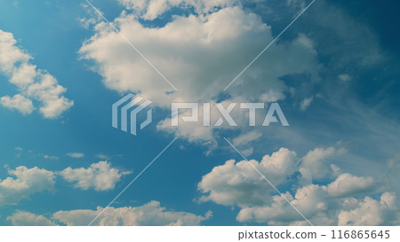 Landscape White Clouds Moving In Opposite Direction. White Clouds Nature. Heavenly Sky With Fresh Clean Air And Blue Skies. White Clouds Background. Landscape White Clouds Moving In Opposite Direction. White Clouds Nature. Heavenly Sky With Fresh Clean Air And Blue Skies. White Clouds Background. 116865645