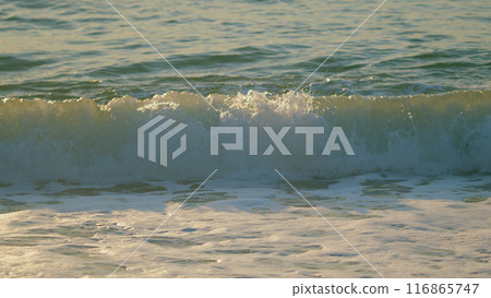 Small Waves On Water Surface With Suns Rays. Natural Background With Sun Glints On Surface Of Water. Slow motion. 116865747
