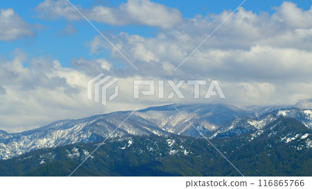Beautiful View Of The Snow-Covered Spruce And Mountains. Blue Clear Sky. Timelapse. Beautiful View Of The Snow-Covered Spruce And Mountains. Blue Clear Sky. Timelapse. 116865766