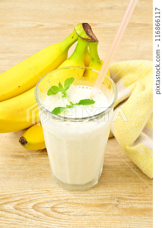 Breakfast: banana juice, banana milk, milk banana, crushed ice. Banana + milk + ice + sugar in a blender. Breakfast: banana juice, banana milk, milk banana, crushed ice. Banana + milk + ice + sugar in a blender. 116866117