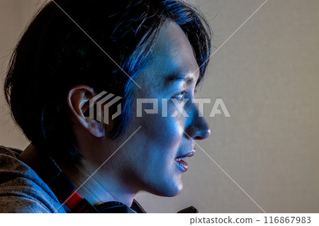 man playing online games 116867983