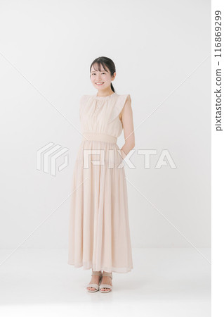 Young woman wearing a dress Young woman wearing a dress 116869299