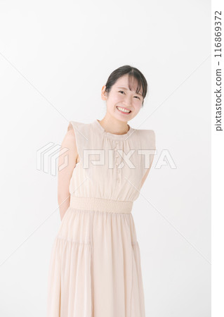 Young woman wearing a dress 116869372