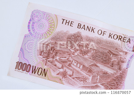 Banknotes of South Korean National Bank in denomination of 1000 Won rear view 116870057