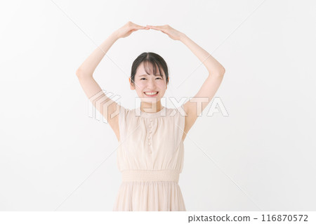 Young woman wearing a dress 116870572