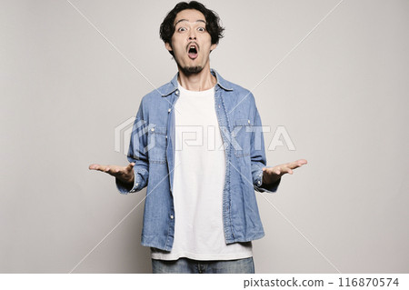 Unique man in denim shirt on white background Unique man in denim shirt on white background 116870574