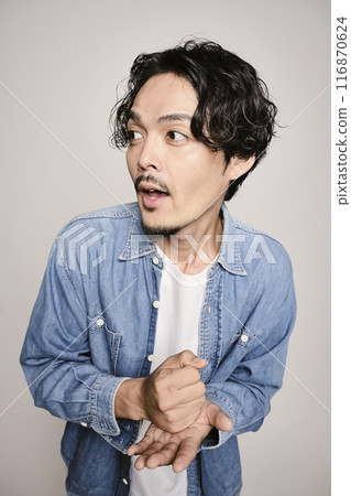 Unique man in denim shirt on white background Unique man in denim shirt on white background 116870624