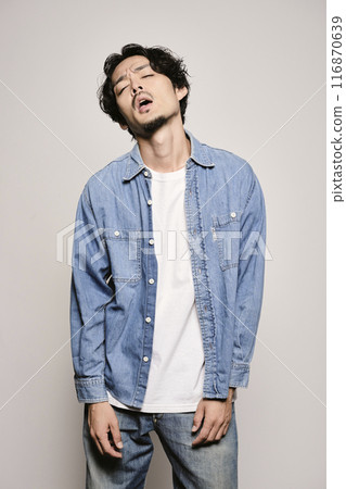 Unique man in denim shirt on white background Unique man in denim shirt on white background 116870639