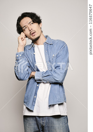 Unique man in denim shirt on white background 116870647