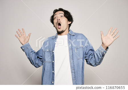 Unique man in denim shirt on white background Unique man in denim shirt on white background 116870655