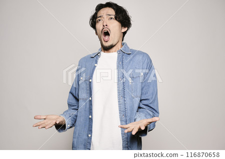 Unique man in denim shirt on white background Unique man in denim shirt on white background 116870658