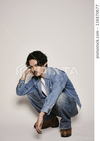 Unique man in denim shirt on white background 116870677