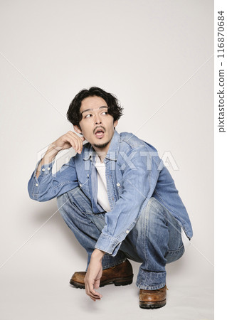 Unique man in denim shirt on white background 116870684