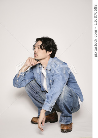 Unique man in denim shirt on white background 116870688