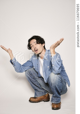 Unique man in denim shirt on white background 116870695