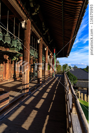 Summer 2024 Evening view of Nigatsudo Hall in Nara - The railings cast long shadows in the setting sun on the stage of Nigatsudo Hall③ Summer 2024 Evening view of Nigatsudo Hall in Nara - The railings cast long shadows in the setting sun on the stage of Nigatsudo Hall③ 116870993