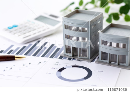Corporate office building with graphs and calculator Corporate office building with graphs and calculator 116871086