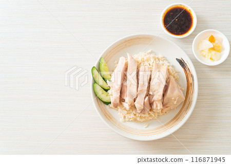 Hainanese chicken rice or rice steamed with chicken soup Hainanese chicken rice or rice steamed with chicken soup 116871945