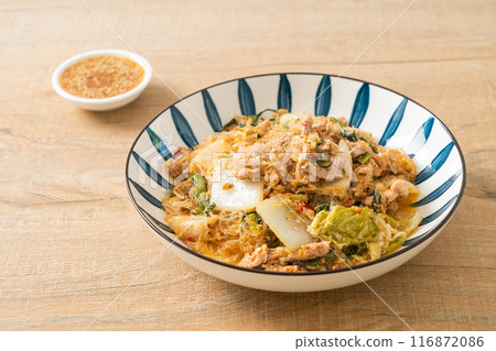 Stir-Fried Thai Styled Sukiyaki or Stir-fried vermicelli with pork and vegetables in sukiyaki sauce Stir-Fried Thai Styled Sukiyaki or Stir-fried vermicelli with pork and vegetables in sukiyaki sauce 116872086
