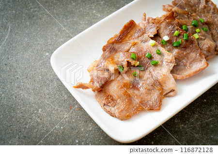 grilled pork neck sliced on plate 116872128