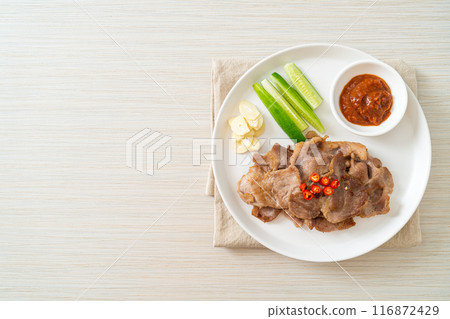 grilled pork neck sliced on plate 116872429