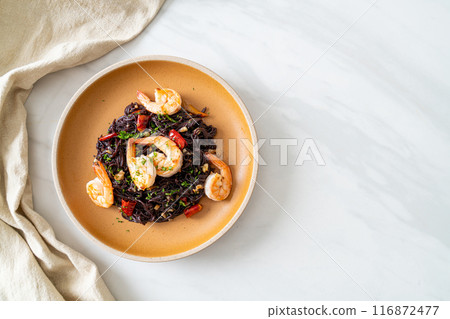 stir-fried black spaghetti with garlic and shrimps stir-fried black spaghetti with garlic and shrimps 116872477