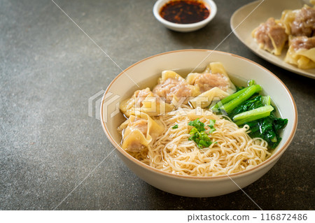 egg noodles with pork wonton soup or pork dumplings soup and vegetable 116872486