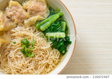 egg noodles with pork wonton soup or pork dumplings soup and vegetable 116872487