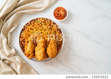 Korean instant noodles with fried chicken or Fried chicken ramyeon Korean instant noodles with fried chicken or Fried chicken ramyeon 116872622