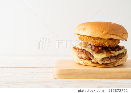 pork burger with cheese, bacon and onion rings 116872731