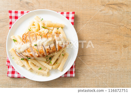 quadrotto penne pasta white creamy sauce with grilled chicken 116872751