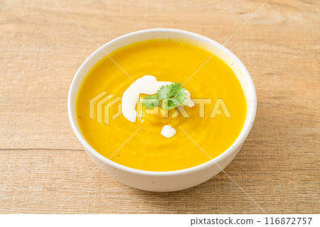pumpkin soup in white bowl 116872757