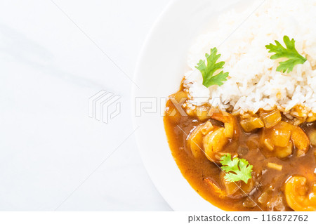 Shrimps in curry sauce on rice 116872762