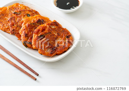 Korean Kimchi pancake or Kimchijeon - Fried Mixed Egg, Kimchi, and Flour 116872769
