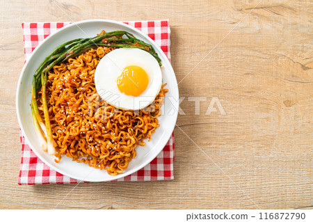 dried Korean spicy instant noodles with fried egg dried Korean spicy instant noodles with fried egg 116872790