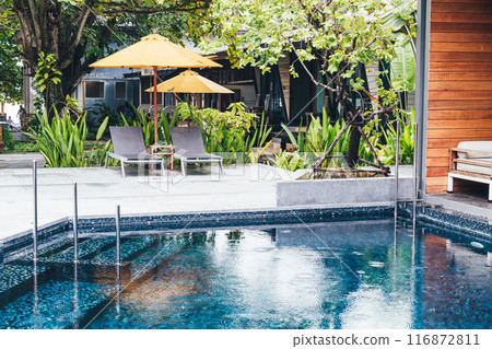 umbrella and pool bed around swimming pool umbrella and pool bed around swimming pool 116872811